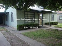 Building Photo - 3 Bedroom, 2 Baths, 2 living rooms with extra large Laundry Room House