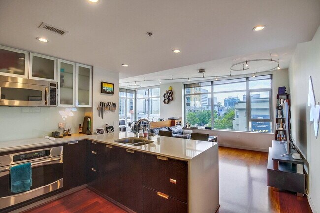 Building Photo - Skyline Views & Sophisticated Corner Living at Aria in Cortez Hill