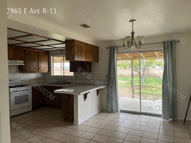 Building Photo - 2945 E Ave R-11