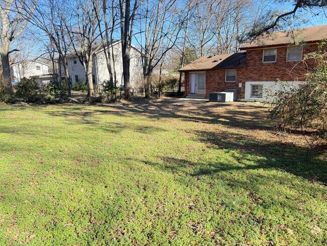Building Photo - Renovated Multi-Story Brick House in East Nashville - Fenced in Yard