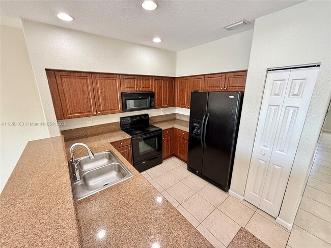 Building Photo - 8380 SW 25th Ct
