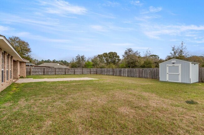 Building Photo - 5659 Tiger Woods Dr