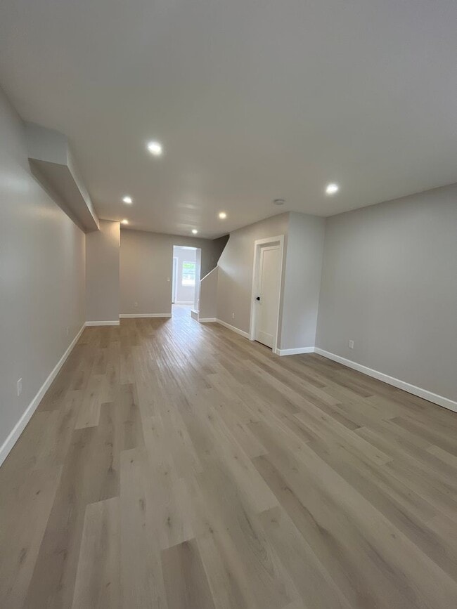 Building Photo - A real stunner! The full renovation is the first thing you'll notice..