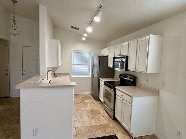 Building Photo - Adorable single story, corner lot home with 3 bedrooms, 2 bathroom and 2 car garage with a huge b...