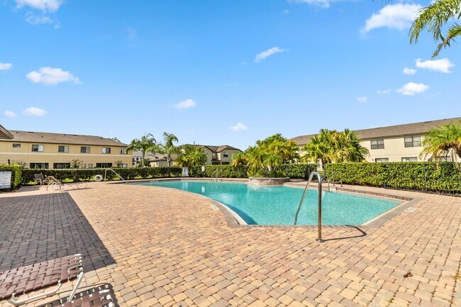 Building Photo - Bright & Stylish 3-Bedroom Townhome with Pond Views in Gated Seven Oaks