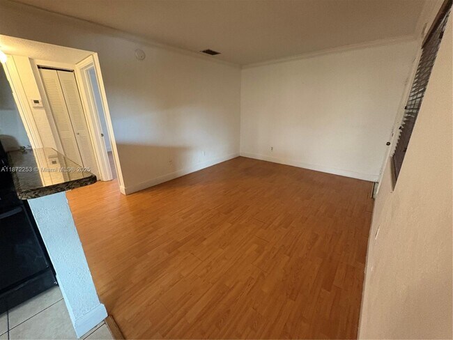 Building Photo - 241 S Royal Poinciana Blvd