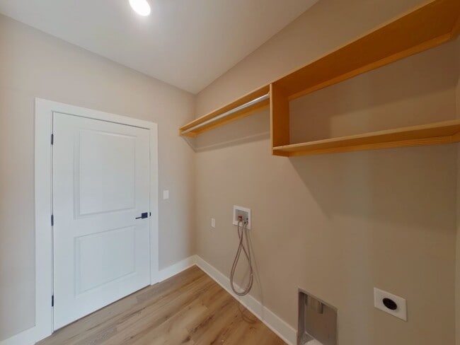 Building Photo - New 4-bedroom Wichita Townhome