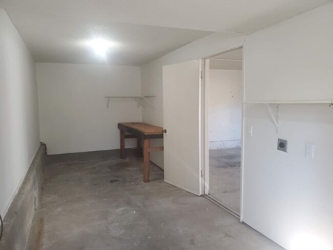 Building Photo - Private 2x2 Santa Rosa Townhouse with pool, 2-car garage, workshop area, fireplace, W/D Hookups