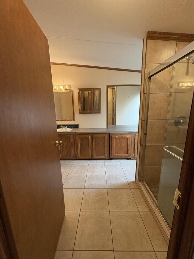 Building Photo - charming 3-bed, 2-bath home is located in the highly desired Strawberry Crest 55+ community