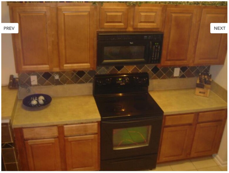 Smooth top electric range with hooded vent microwave - 6111 Maggies Cir