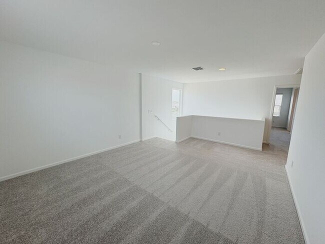 Building Photo - MOVE IN SPECIALS!! ONE MONTH RENT FREE!! New 5-Bedroom Home in Phoenix with Upgrades!