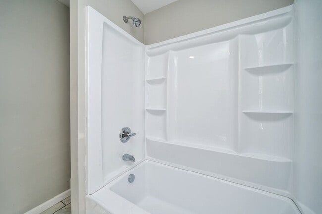 Building Photo - Move-In Ready 4BR with Renovated Interiors...