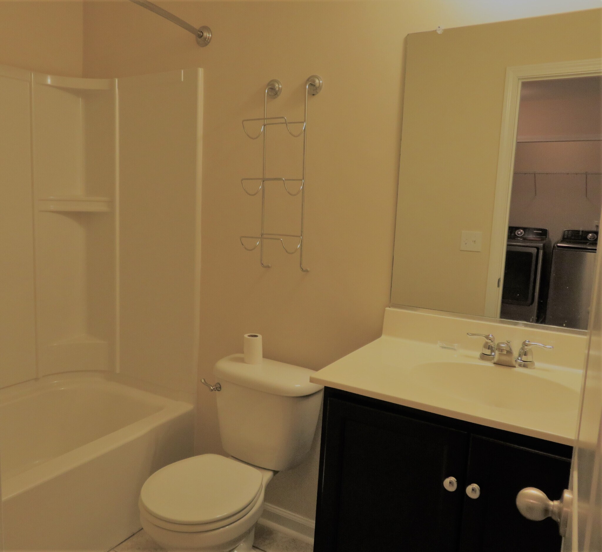 Full Bath by Bedroom 3 w built-in shower shelves, towel racks over toilet, & tile flooring - 2496 Stadium Dr