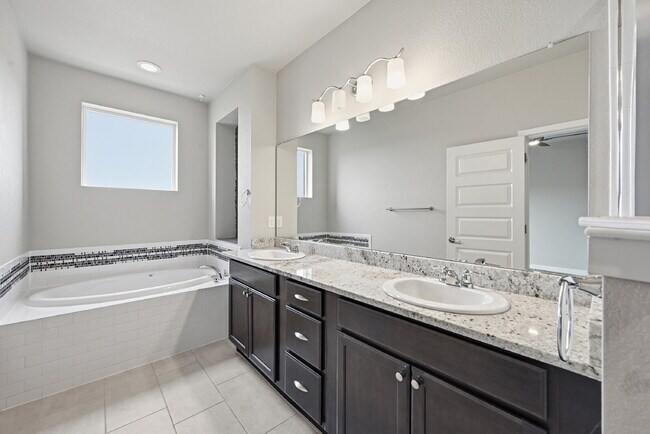 Building Photo - $2,695.45 3-bed, 2.5-bath townhome with a washer and dryer.