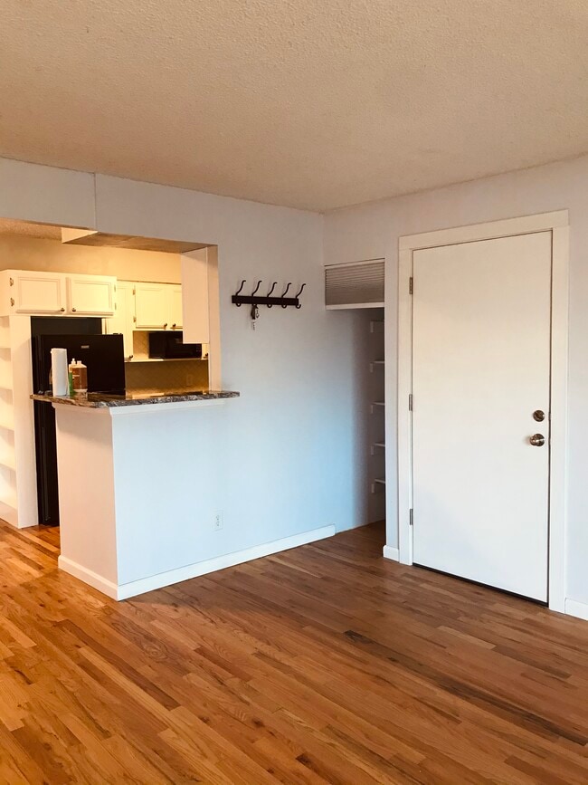 entry way and small closet - 7080 W 20th Ave