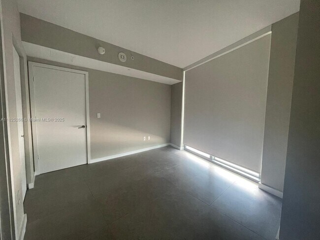Building Photo - 1300 S Miami Ave