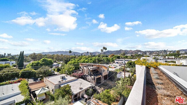 Building Photo - 1123 N Formosa Ave