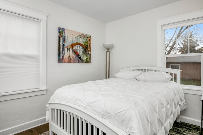 Queen bed. - 2117 W Jefferson St