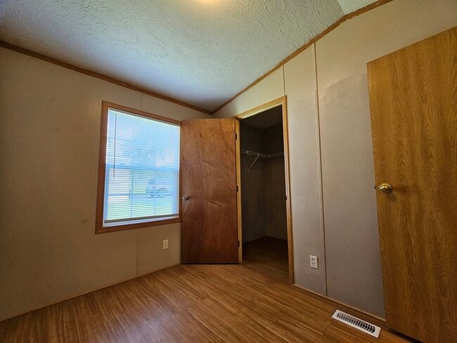 Building Photo - Own cheaper than rent