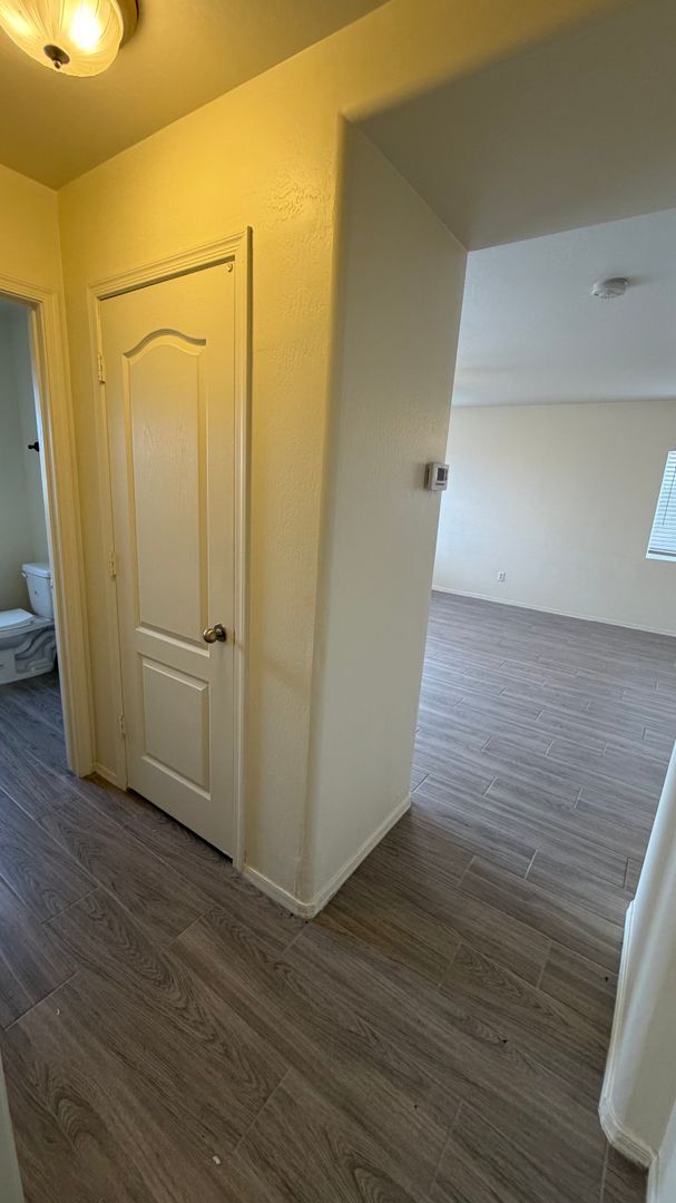 Building Photo - Two Story Home with NEW tile and a large backyard!