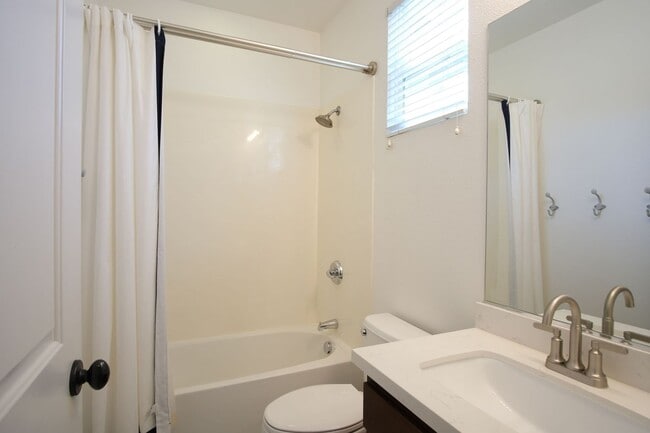 Building Photo - NOW AVAILABLE- NEW PRICE! Spacious 3-Bed, ...