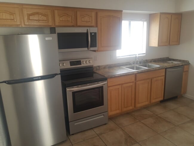 Building Photo - Tacna Senior Townhomes (Age 55+)