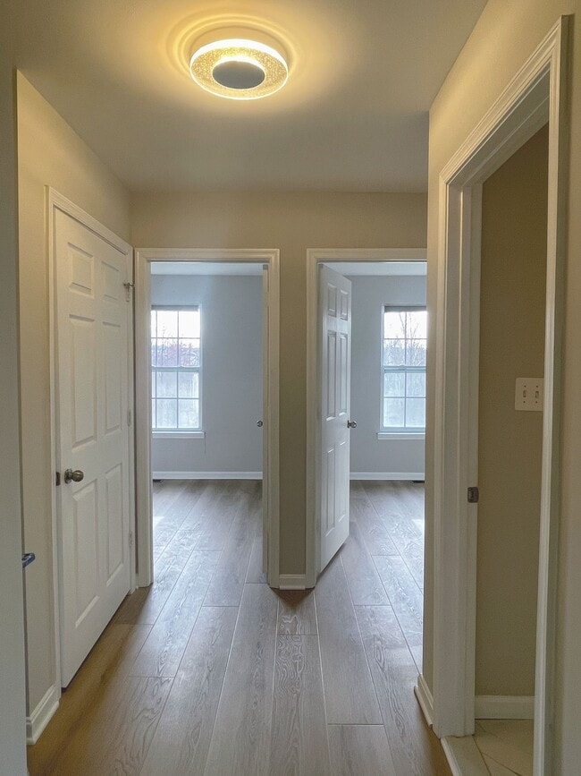 Upstairs hallway and 2 bedrooms - 12430 Horseshoe Bend Cir