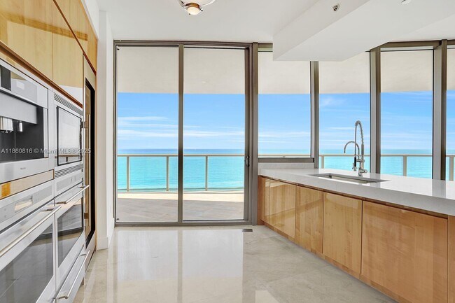 Building Photo - 9703 Collins Ave