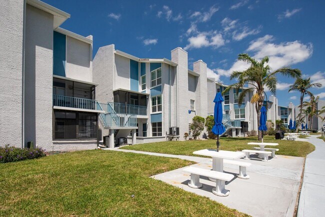 Building Photo - Gated Waterfront Community  1-Bedroom 1.5 ...