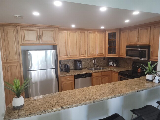 Building Photo - 19370 Collins Ave