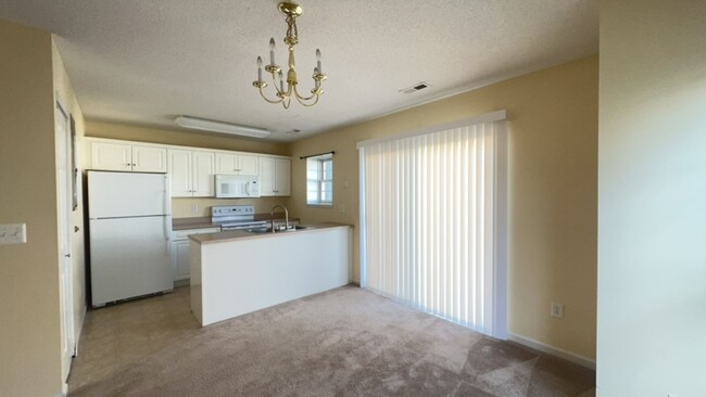 Building Photo - Spacious 3-Bedroom End Unit in Liberty Squ...