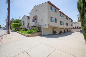 Building Photo - 7409 Woodman Ave