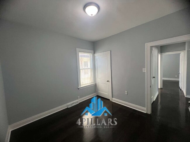 Building Photo - "Charming 3-Bed Home with Partially Finished Basement & Gleaming Hardwood Floors in Hammond - 226...
