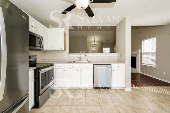 Building Photo - Turn the key. Enter. Smile. Repeat every day!