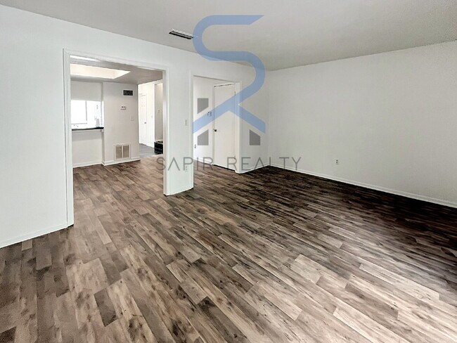 Building Photo - Move in before December 15th and choose your reward: a $250 Amazon Gift Card or a 55" Smart TV!