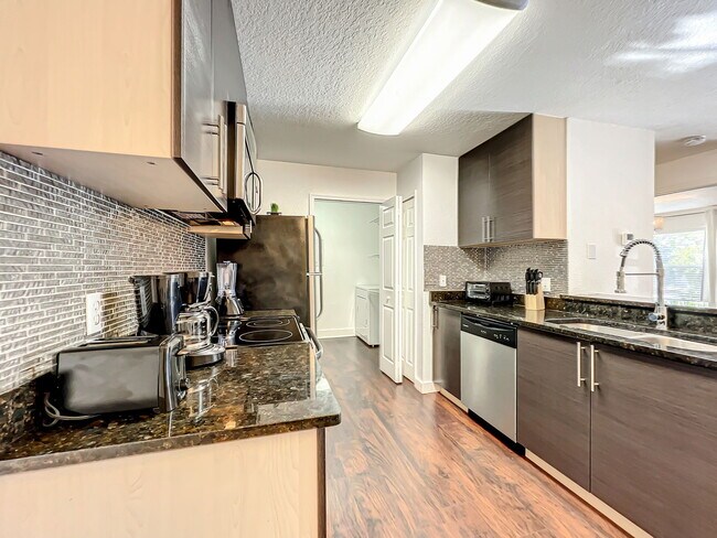 Building Photo - Pissarro Drive, Orlando, FL 32819 - 1 BR 1 BA condo