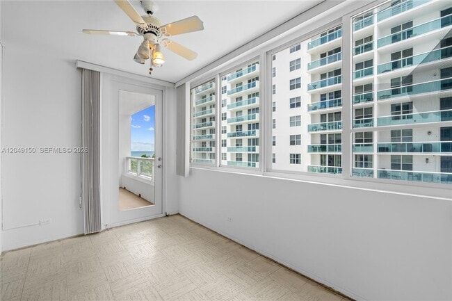 Building Photo - 5005 Collins Ave