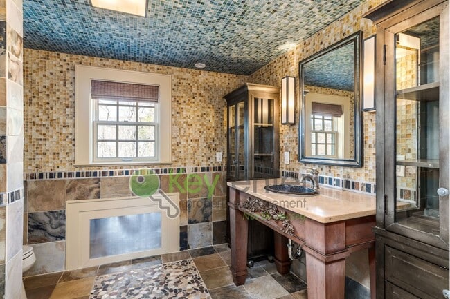 Building Photo - Charming 4-Bedroom Home on 2 Acres—Woods, Trails & Exceptional Storage