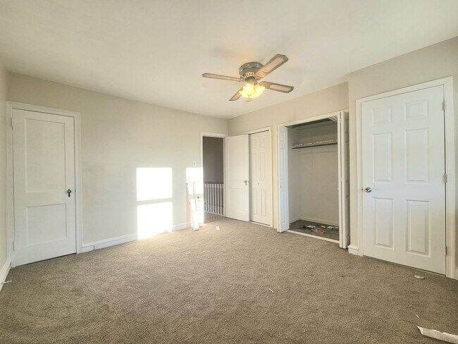 Building Photo - Stunning 4-Bedroom Townhome with Finished ...