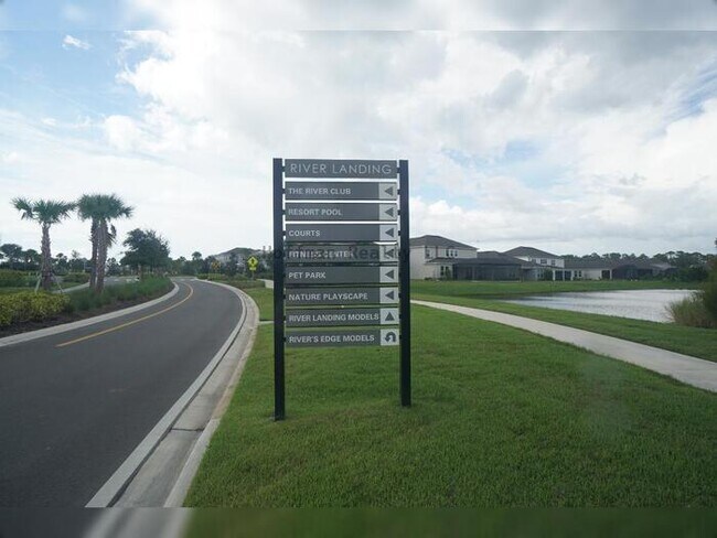 Building Photo - Stunning 5-Bedroom Lakeview Home in River Landing, Wesley Chapel