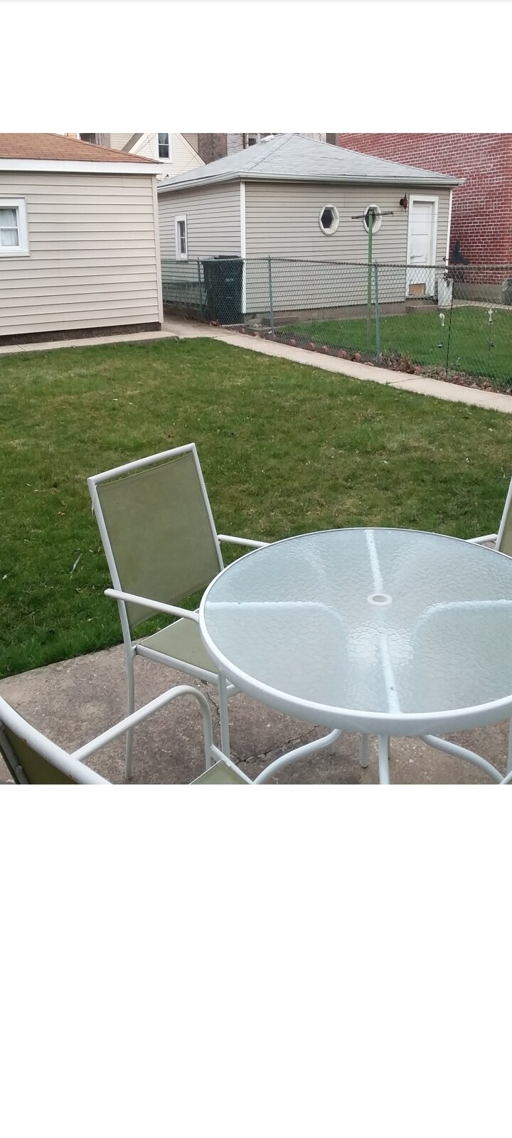 Seating area in patio, shared space - 3405 S May St