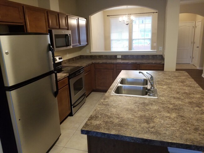 Building Photo - 4220 Plantation Oaks Blvd