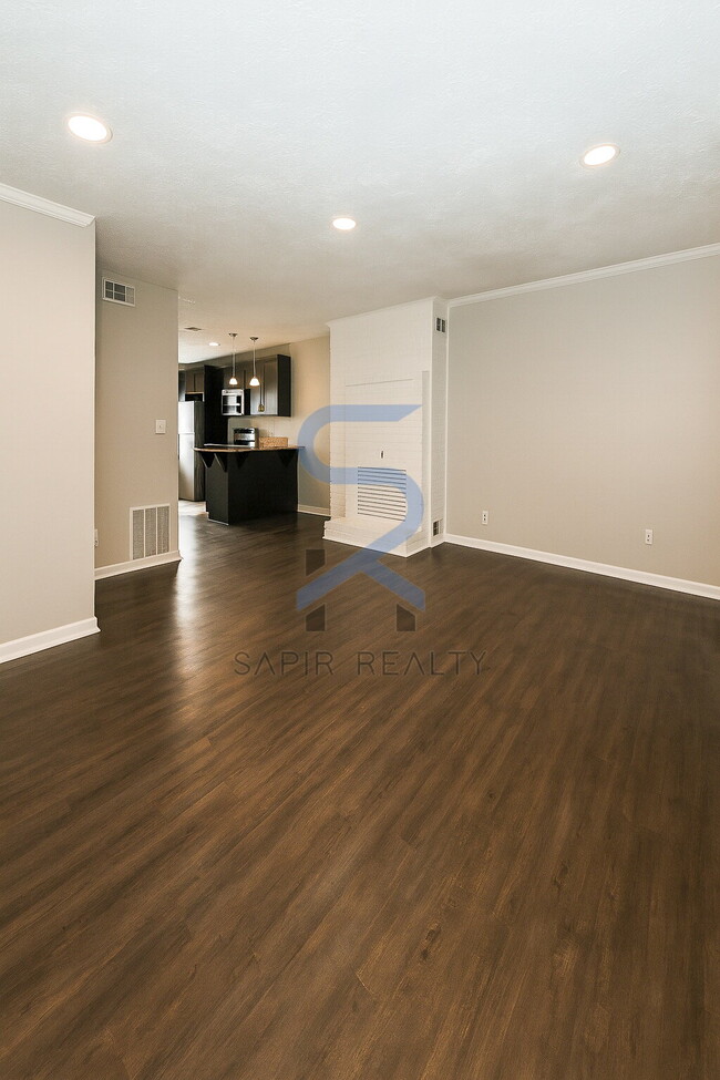 Building Photo - Move in before December 31st and choose your reward: a $250 Amazon Gift Card or a 55" Smart TV!