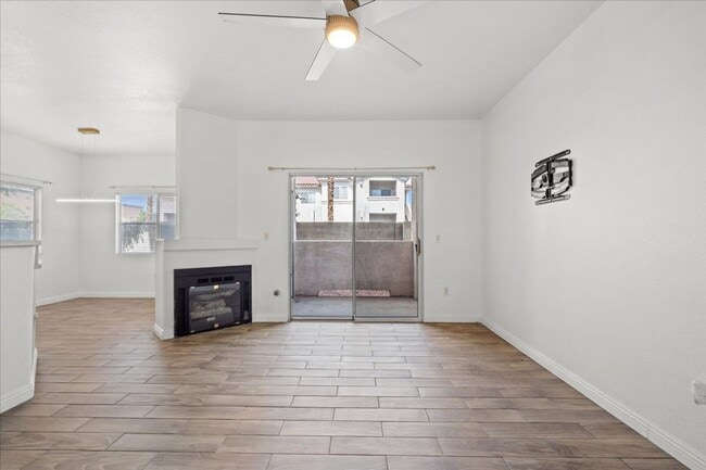 Building Photo - Charming 2-Bedroom First Floor Featuring Open Layout, Fireplace, Patio & Community Pool
