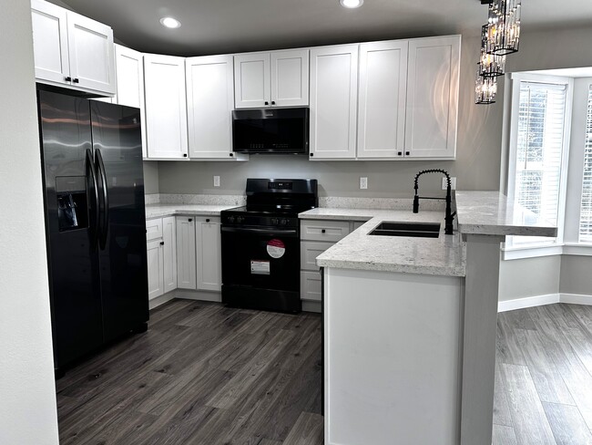 Building Photo - 207 S Razor Clam Dr SW