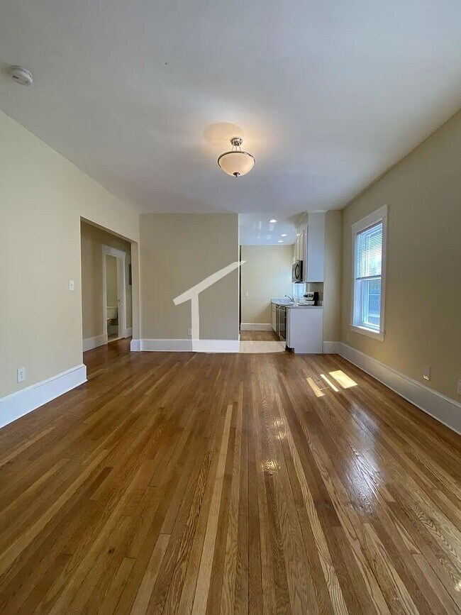 Building Photo - No Brokers Fee, Large Renovated Unit, Steps from the T Stop, Heat, Hot Water Included,