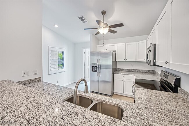 Building Photo - 16840 Sanibel Sunset Ct