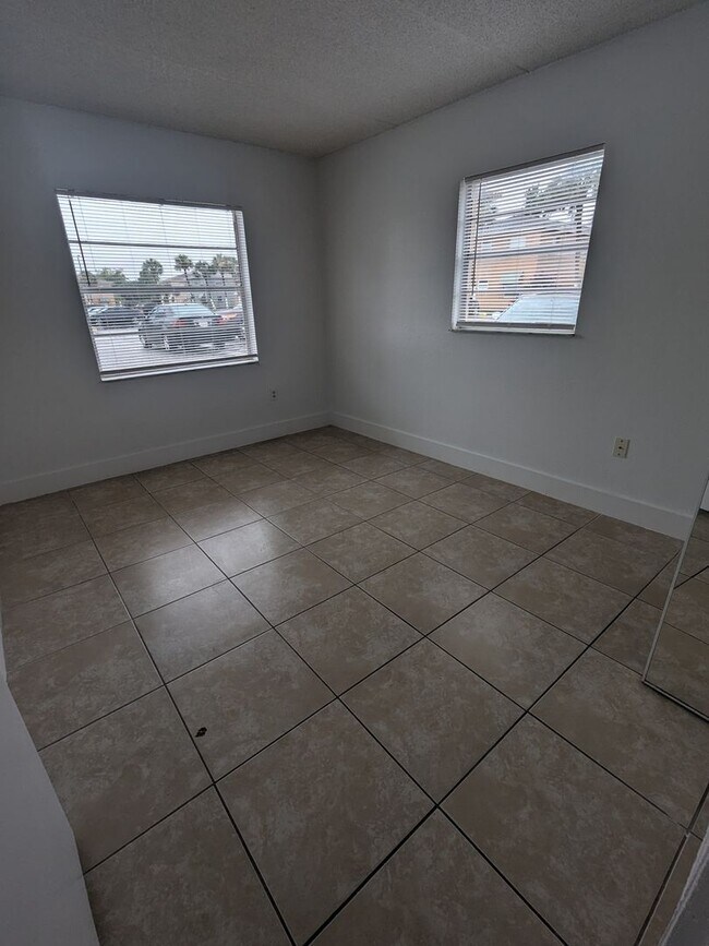 Building Photo - Palm Gardens - First Floor