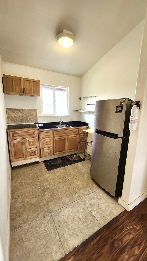 Building Photo - Ah Puck, Jordanah &amp; Tyson