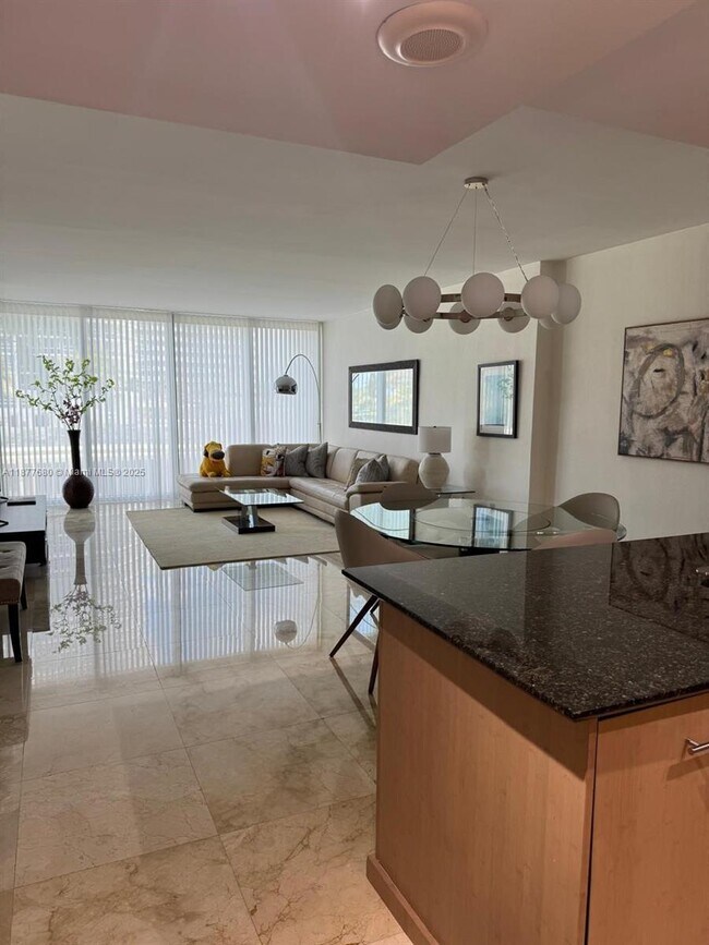 Building Photo - 10275 Collins Ave